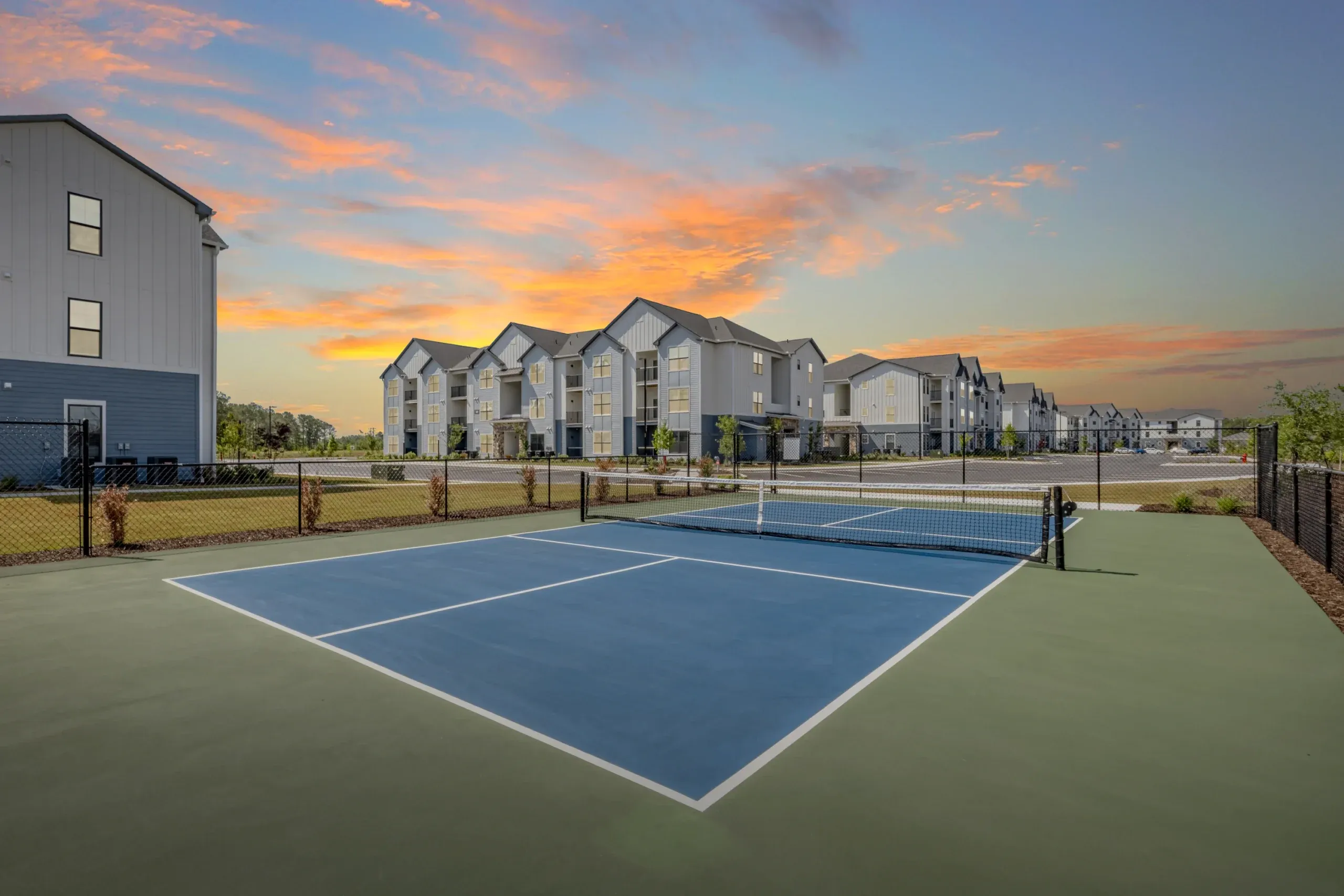 Evolve Holly Ridge tennis courts at night
